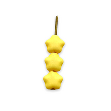 Load image into Gallery viewer, Czech glass tiny star beads 50pc opaque matte yellow 6mm
