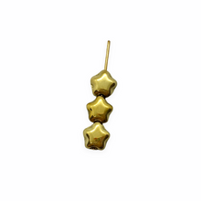 Load image into Gallery viewer, Czech glass tiny star beads 50pc shiny gold metallic 6mm
