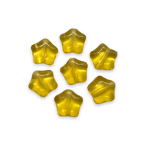 Load image into Gallery viewer, Czech glass star beads 25pc translucent topaz yellow 8mm
