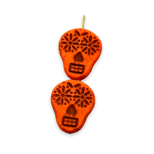 Load image into Gallery viewer, Czech glass sugar skull beads 4pc UV neon orange 20x17mm
