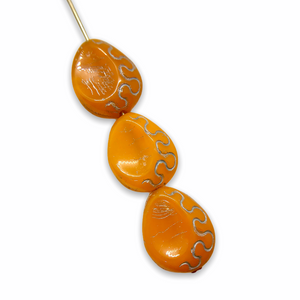 Czech glass carved thumbprint teardrop beads 12pc orange silver 13x11mm