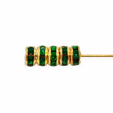 Load image into Gallery viewer, Czech crystal rhinestone rondelle gold emerald green 10pc 5mm
